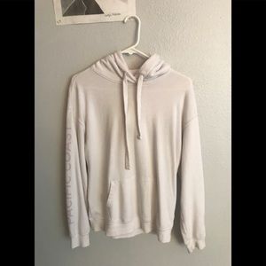 Garage white hoodie with purple/ pink designs.